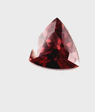 1.64 ct Triangular Brownish-Purple Pink Zircon