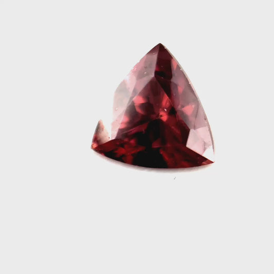 1.64 ct Triangular Brownish-Purple Pink Zircon