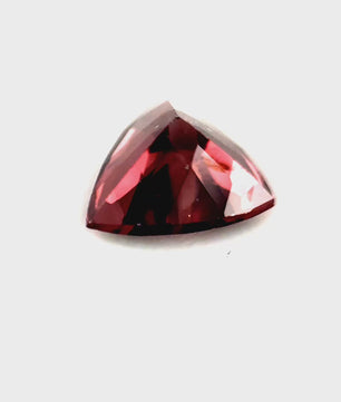 1.64 ct Triangular Brownish-Purple Pink Zircon