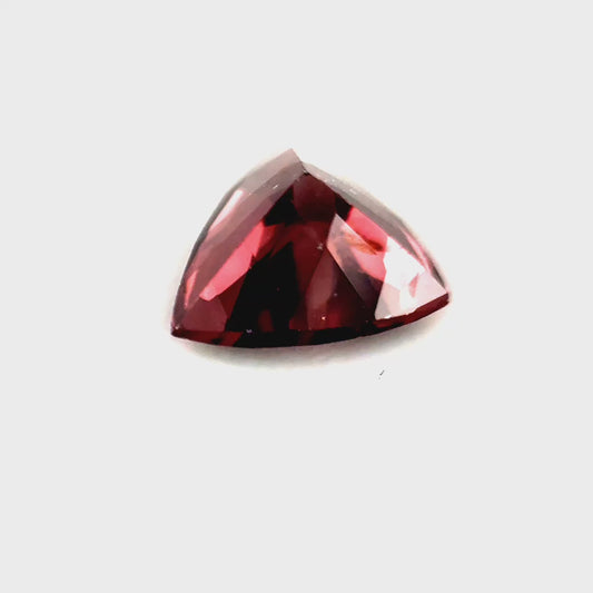 1.64 ct Triangular Brownish-Purple Pink Zircon